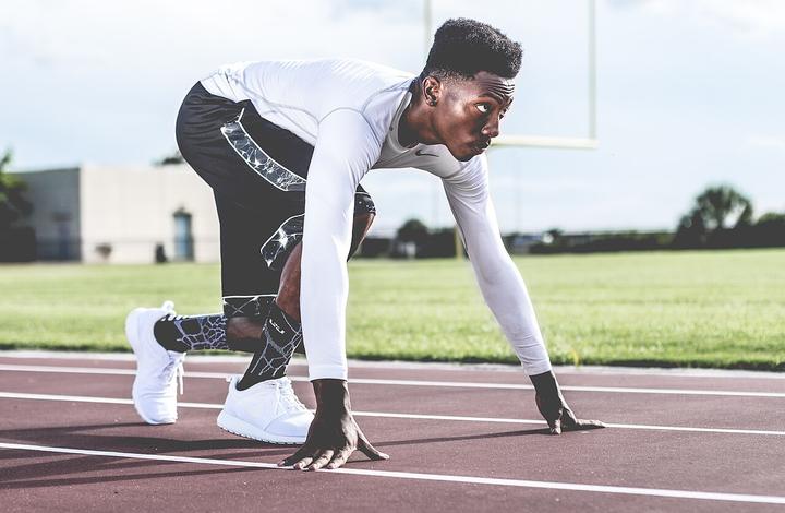 Sprinter in the set position on the track